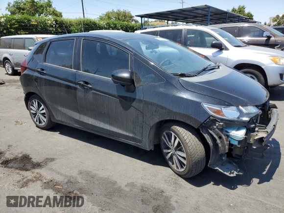2018 Honda Fit EX with VIN 3HGGK5H86JM718717, listed as a Copart auction lot 63777545 with 88,669 mi miles and Salvage title. Bid and sale history available at DreamBid. Image 4.