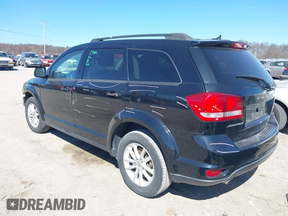 2016 Dodge Journey SXT with VIN 3C4PDCBGXGT123087, listed as a IAAI auction lot 41869667 with 256,583 mi miles. Bid and sale history available at carsss.com. Image 3.
