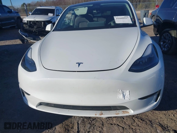 2023 Tesla Model Y Long Range with VIN 7SAYGAEE3PF753657, listed as a IAAI auction lot 41668917 with 33,301 mi miles and . Bid and sale history available at DreamBid. Image 13.