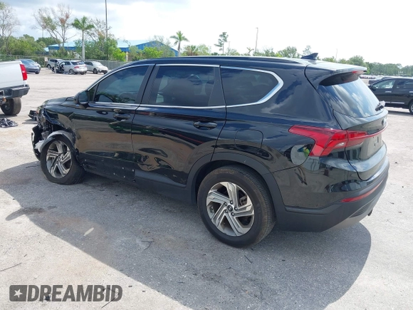 2021 Hyundai Santa Fe SE z VIN 5NMS14AJ0MH332918, wystawiony jako IAAI lot #42365534 z przebiegiem 58 720 mil mil oraz . Historia ofert i sprzedaży dostępna na DreamBid. Obrazek 3.