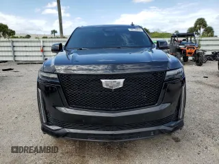 2021 Cadillac Escalade z VIN 1GYS3PKL6MR288828, wystawiony jako Copart lot #78219414 z przebiegiem 22 362 mil mil oraz Czysty tytuł • Clean title. Historia ofert i sprzedaży dostępna na DreamBid. Obrazek 5.