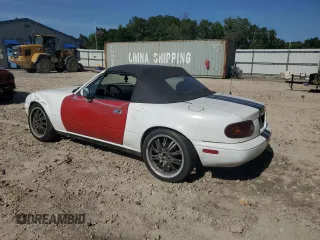 1991 Mazda MX-5 Miata Special Edition z VIN JM1NA3515M0231262, wystawiony jako Copart lot #57221675 z przebiegiem 241 670 mil mil oraz Szkoda całkowita • Salvage title. Historia ofert i sprzedaży dostępna na DreamBid. Obrazek 2.