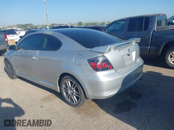 2008 Scion tC Spec with VIN JTKDE167280242922, listed as a IAAI auction lot 41872367 with 167,702 mi miles. Bid and sale history available at carsss.com. Image 3.
