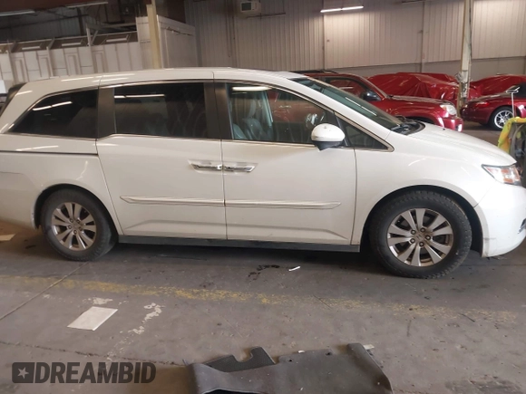 2014 Honda Odyssey EX-L with VIN 5FNRL5H60EB030841, listed as a IAAI auction lot 42271401 with 107,343 mi miles and . Bid and sale history available at DreamBid. Image 14.