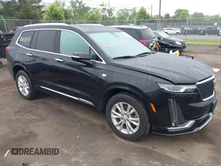 2024 Cadillac XT6 AWD Luxury with VIN 1GYKPBR45RZ750986, listed as a IAAI auction lot 42605419 with 50,929 mi miles and . Bid and sale history available at DreamBid. Image 1.