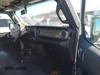 2023 Jeep Gladiator High Altitude with VIN 1C6HJTFG4PL560982, listed as a IAAI auction lot 41236477 with 28,835 mi miles and . Bid and sale history available at DreamBid. Image 5.