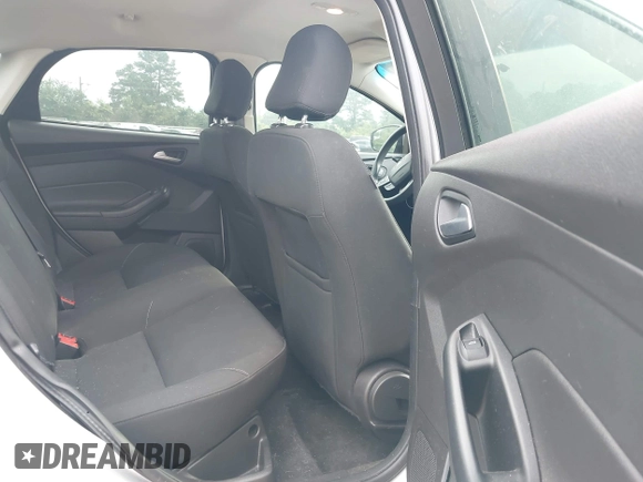 2016 Ford Focus SE with VIN 1FADP3F20GL325141, listed as a IAAI auction lot 42472407 with 103,799 mi miles and . Bid and sale history available at DreamBid. Image 8.