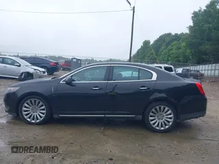 2014 Lincoln MKS z VIN 1LNHL9DK0EG610145, wystawiony jako IAAI lot #42348345 z przebiegiem 61 289 mil mil oraz . Historia ofert i sprzedaży dostępna na DreamBid. Obrazek 15.