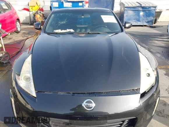 2014 Nissan 370Z Touring with VIN JN1AZ4EH1EM631097, listed as a IAAI auction lot 41230197 with 85,304 mi miles. Bid and sale history available at carsss.com. Image 12.