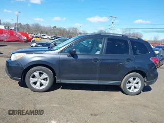 2014 Subaru Forester Premium z VIN JF2SJAECXEH524636, wystawiony jako IAAI lot #41720660 z przebiegiem 174 909 mil mil oraz . Historia ofert i sprzedaży dostępna na DreamBid. Obrazek 14.