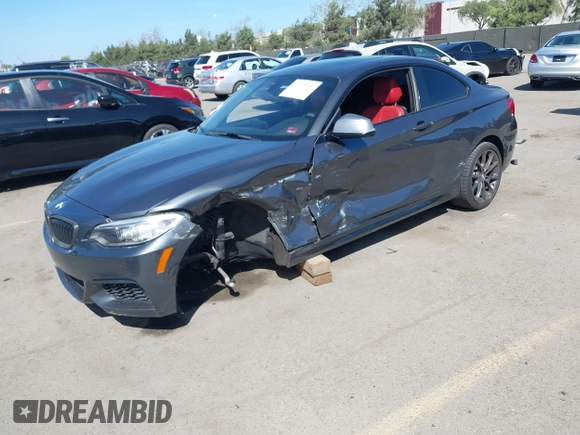 2014 BMW 2 Series M235i with VIN WBA1J7C51EVX33702, listed as a IAAI auction lot 41713337 with 83,076 mi miles. Bid and sale history available at carsss.com. Image 18.