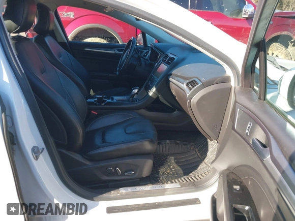 2016 Ford Fusion Titanium with VIN 3FA6P0K98GR150939, listed as a IAAI auction lot 40994523 with 144,051 mi miles. Bid and sale history available at carsss.com. Image 5.