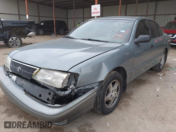 1998 Toyota Avalon XL with VIN 4T1BF18B7WU224978, listed as a IAAI auction lot 41357561 with 306,375 mi miles and . Bid and sale history available at DreamBid. Image 17.
