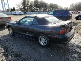 1998 Ford Mustang with VIN 1FAFP4449WF153210, listed as a Copart auction lot 44126725 with 143,249 mi miles and Salvage Title. Bid and sale history available at carsss.com. Image 2.