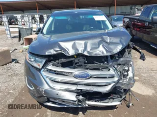 2015 Ford Edge Titanium z VIN 2FMPK4K83FBB30411, wystawiony jako IAAI lot #42230235 z przebiegiem 69 094 mil mil oraz . Historia ofert i sprzedaży dostępna na DreamBid. Obrazek 13.