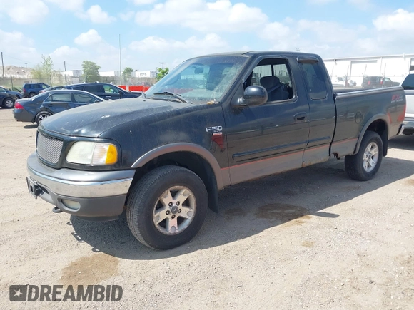 2002 Ford F-150 XL with VIN 1FTRX18L82NA18808, listed as a IAAI auction lot 42259883 with 154,519 mi miles and . Bid and sale history available at DreamBid. Image 2.