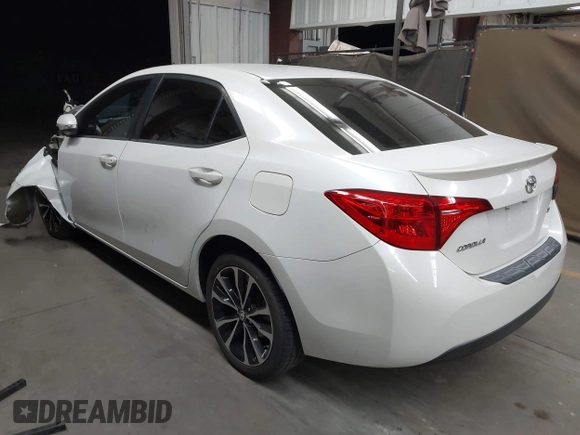 2017 Toyota Corolla L with VIN 5YFBURHE7HP693037, listed as a IAAI auction lot 42304020 with 117,710 mi miles and . Bid and sale history available at DreamBid. Image 3.