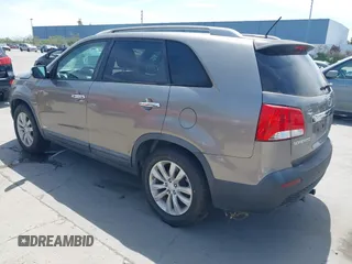 2011 Kia Sorento EX with VIN 5XYKUDA29BG055919, listed as a IAAI auction lot 42105406 with 146,302 mi miles. Bid and sale history available at carsss.com. Image 3.