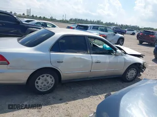 2002 Honda Accord LX z VIN JHMCG56462C005400, wystawiony jako IAAI lot #41893400 z przebiegiem Nie podano mil oraz . Historia ofert i sprzedaży dostępna na DreamBid. Obrazek 14.