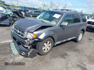 2011 Ford Escape Limited with VIN 1FMCU9EG2BKC55005, listed as a IAAI auction lot 41958212 with 188,182 mi miles. Bid and sale history available at carsss.com. Image 2.