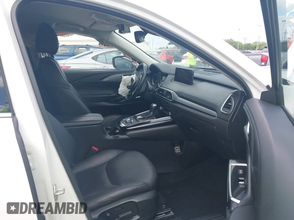 2022 Mazda CX-9 Touring with VIN JM3TCBCY0N0608052, listed as a IAAI auction lot 42027465 with 65,313 mi miles and . Bid and sale history available at DreamBid. Image 5.