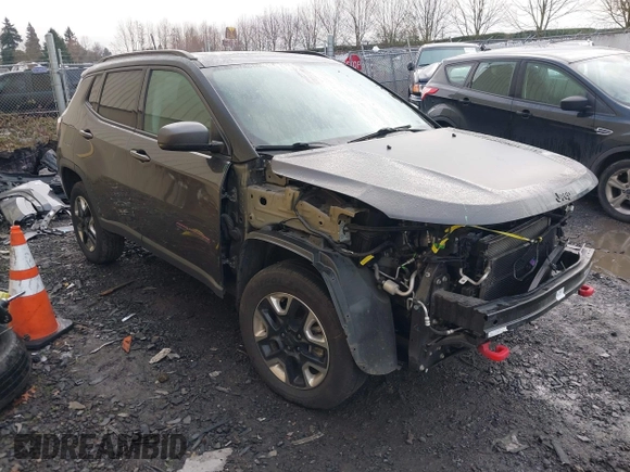2017 Jeep Compass Trailhawk with VIN 3C4NJDDB9HT657173, listed as a IAAI auction lot 41613348 with 60,781 mi miles and . Bid and sale history available at DreamBid. Image 1.