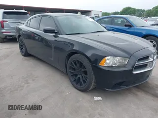 2013 Dodge Charger SE z VIN 2C3CDXBG3DH512295, wystawiony jako IAAI lot #41912960 z przebiegiem 191 828 mil mil oraz . Historia ofert i sprzedaży dostępna na DreamBid. Obrazek 1.