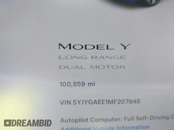 2021 Tesla Model Y Long Range with VIN 5YJYGAEE1MF207948, listed as a IAAI auction lot 41779570 with 100,859 mi miles. Bid and sale history available at carsss.com. Image 7.