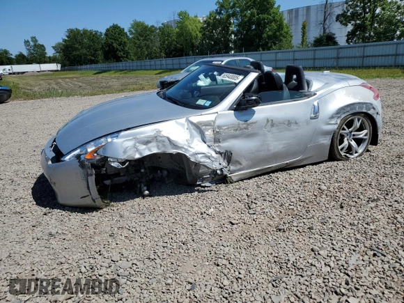 2012 Nissan 370Z Touring with VIN JN1AZ4FH3CM370910, listed as a Copart auction lot 65940005 with 23,009 mi miles and Salvage title. Bid and sale history available at DreamBid. Image 1.