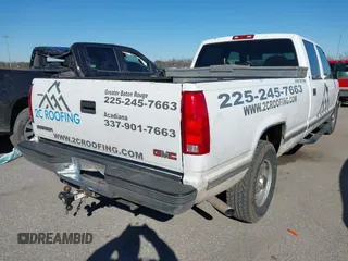 1999 GMC Sierra 3500 z VIN 1GTGC33R4XF094778, wystawiony jako IAAI lot #41229630 z przebiegiem 199 345 mil mil oraz . Historia ofert i sprzedaży dostępna na DreamBid. Obrazek 4.
