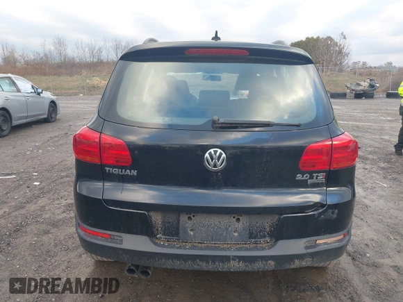 2015 Volkswagen Tiguan SE z VIN WVGBV7AXXFW612903, wystawiony jako IAAI lot #41017461 z przebiegiem 149 297 mil mil oraz . Historia ofert i sprzedaży dostępna na DreamBid. Obrazek 17.