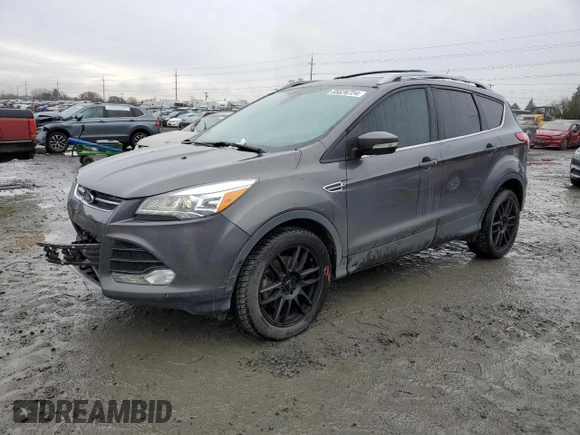 2015 Ford Escape Titanium with VIN 1FMCU9J92FUA62323, listed as a Copart auction lot 85826724 with 108,315 mi miles and Salvage Title. Bid and sale history available at DreamBid. Image 1.