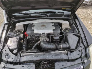 2009 Cadillac CTS AWD z VIN 1G6DT57V190103855, wystawiony jako Copart lot #50202255 z przebiegiem 249 540 mil mil oraz Szkoda całkowita • Salvage title. Historia ofert i sprzedaży dostępna na DreamBid. Obrazek 11.