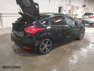 2015 Ford Focus ST with VIN 1FADP3L90FL305407, listed as a IAAI auction lot 41508693 with 172,191 mi miles. Bid and sale history available at carsss.com. Image 4.