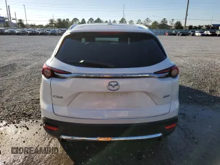 2017 Mazda CX-9 Grand Touring z VIN JM3TCADYXH0127867, wystawiony jako Copart lot #82352204 z przebiegiem 129 349 mil mil oraz Szkoda całkowita • Salvage title. Historia ofert i sprzedaży dostępna na DreamBid. Obrazek 6.