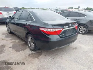 2015 Toyota Camry XLE with VIN 4T1BF1FK0FU036273, listed as a IAAI auction lot 42196339 with 195,857 mi miles and . Bid and sale history available at DreamBid. Image 3.