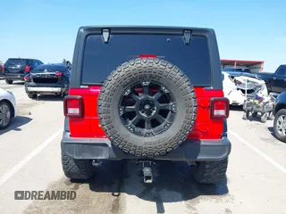 2018 Jeep Wrangler Unlimited Sport S z VIN 1C4HJXDGXJW168940, wystawiony jako IAAI lot #42200607 z przebiegiem 60 308 mil mil oraz . Historia ofert i sprzedaży dostępna na DreamBid. Obrazek 16.