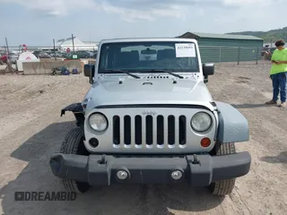2011 Jeep Wrangler Sport with VIN 1J4AA2D18BL546069, listed as a IAAI auction lot 42139693 with 56,395 mi miles and . Bid and sale history available at carsss.com. Image 13.