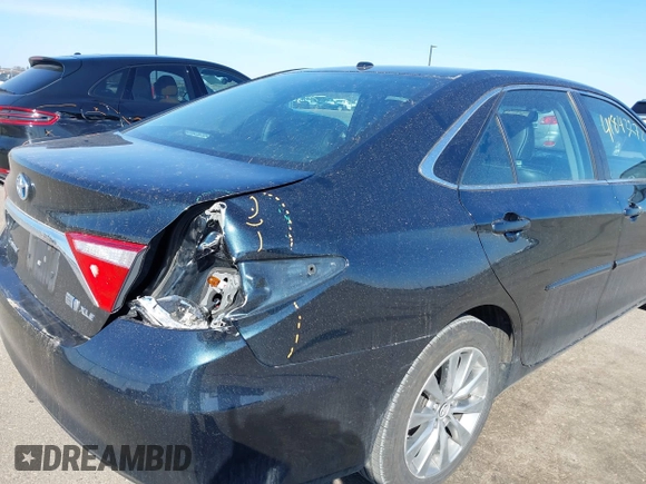 2015 Toyota Camry LE z VIN 4T1BD1FK8FU148065, wystawiony jako IAAI lot #41843278 z przebiegiem 91 137 mil mil oraz . Historia ofert i sprzedaży dostępna na DreamBid. Obrazek 6.