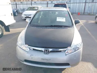 2007 Honda Civic Sdn EX with VIN 1HGFA16807L069520, listed as a IAAI auction lot 41957002 with 135,990 mi miles. Bid and sale history available at carsss.com. Image 6.