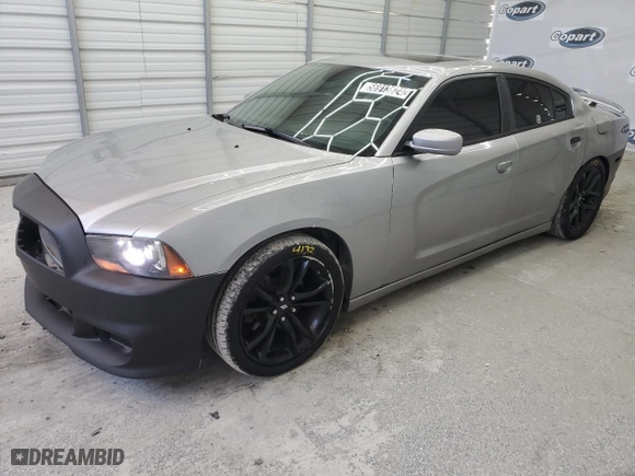 2011 Dodge Charger RT Max with VIN 2B3CM5CT1BH551543, listed as a Copart auction lot 56913624 with 104,221 mi miles and Clean Title. Bid and sale history available at carsss.com. Image 1.