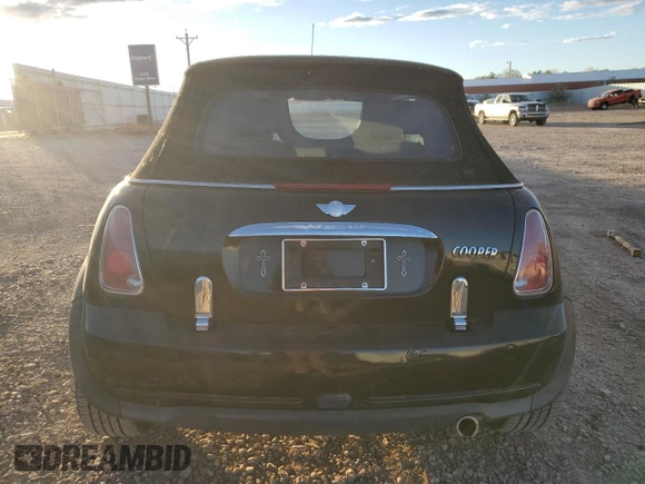 2007 MINI Convertible with VIN WMWRF33597TG16707, listed as a Copart auction lot 79104014 with 113,380 mi miles and Salvage Title. Bid and sale history available at DreamBid. Image 6.