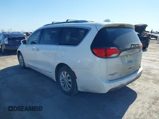 2018 Chrysler Pacifica Touring L with VIN 2C4RC1BG1JR119682, listed as a IAAI auction lot 41762362 with 167,380 mi miles and . Bid and sale history available at DreamBid. Image 3.