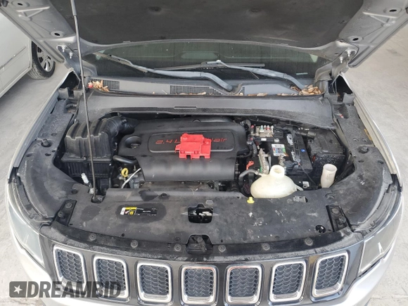 2019 Jeep Compass Altitude with VIN 3C4NJDBB3KT599863, listed as a Copart auction lot 57561965 with 72,482 mi miles and Salvage title. Bid and sale history available at DreamBid. Image 12.