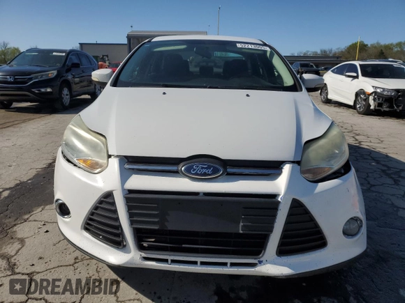 2012 Ford Focus S with VIN 1FAHP3E23CL402355, listed as a Copart auction lot 52213005 with 160,999 mi miles and Salvage Title. Bid and sale history available at DreamBid. Image 5.