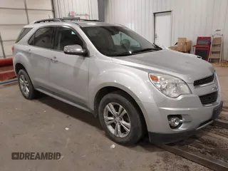 2013 Chevrolet Equinox LTZ z VIN 2GNFLGEK9D6256937, wystawiony jako IAAI lot #41390870 z przebiegiem 161 672 mil mil oraz . Historia ofert i sprzedaży dostępna na DreamBid. Obrazek 1.