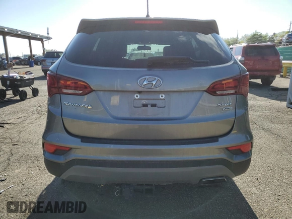 2018 Hyundai Santa Fe 2.4L с VIN 5XYZTDLB1JG542982, выставлен на аукционе Copart как лот 55081465 с пробегом 86 862 миль миль и Списание • Salvage title. История ставок и продаж доступна на DreamBid. Изображение 6.