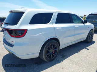 2018 Dodge Durango SRT with VIN 1C4SDJGJ4JC341550, listed as a IAAI auction lot 42147955 with 86,503 mi miles and . Bid and sale history available at DreamBid. Image 4.