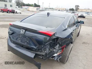 2020 Honda Civic Sedan EX-L with VIN 19XFC1F74LE209538, listed as a IAAI auction lot 42035988 with 51,893 mi miles. Bid and sale history available at carsss.com. Image 4.