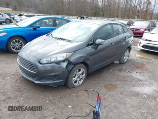 2016 Ford Fiesta SE with VIN 3FADP4BJ2GM196952, listed as a IAAI auction lot 41694838 with 121,192 mi miles and . Bid and sale history available at DreamBid. Image 2.